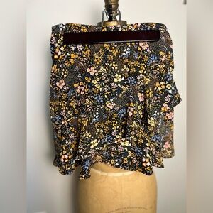 Altar’d State black floral
Mini skirt with ruffle size small